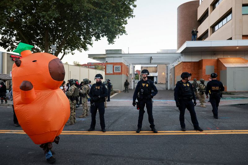 Trump’s Insurrection Act Threat Sparks Conflict with Democratic Cities